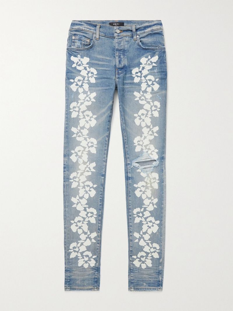 Amiri Hibiscus Skinny-Fit Distressed Printed Jeans — view 1