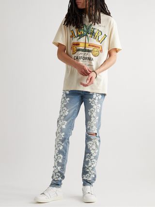 Amiri Hibiscus Skinny-Fit Distressed Printed Jeans — view 2