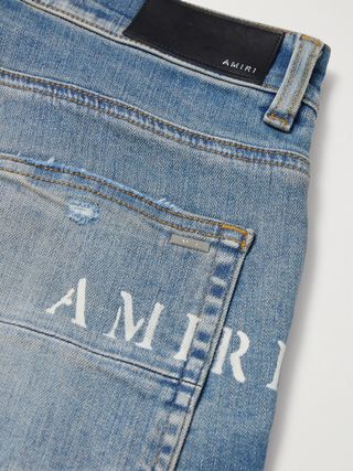 Amiri Hibiscus Skinny-Fit Distressed Printed Jeans — view 3