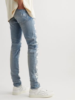 Amiri Hibiscus Skinny-Fit Distressed Printed Jeans — view 4